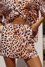 Load image into Gallery viewer, Adelyn Mini Skirt - Tikani Leopard
